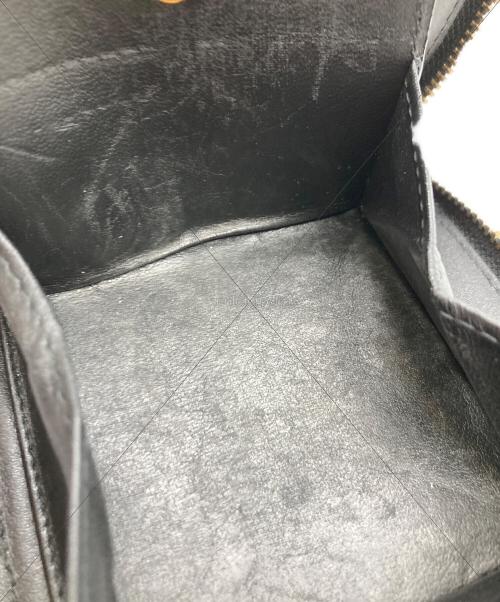 COMME des GARCONS（コムデギャルソン）COMME des GARCONS (コムデギャルソン) EMBOSSED LOGOTYPE FULL ZIP AROUND WALLET ブラックの古着・服飾アイテム