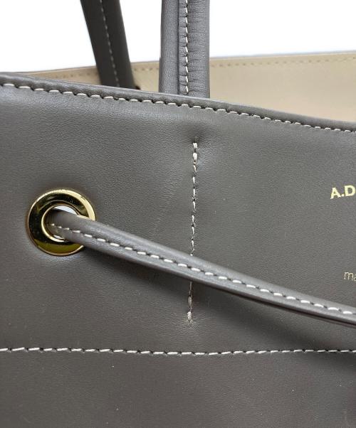 A.D.M.J.（エーディーエムジェイ）A.D.M.J. (エーディーエムジェイ) BLUGAROPLUS TASSEL CONCLUSION TOTE/19SA01014 ベージュの古着・服飾アイテム