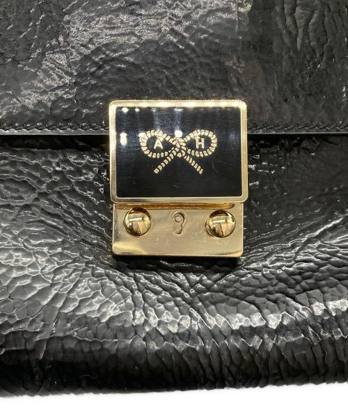 ANYA HINDMARCH（アニヤ・ハインドマーチ）ANYA HINDMARCH (アニヤ・ハインドマーチ) エナメルスモールカーカーハンドバッグ ブラックの古着・服飾アイテム