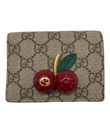 GUCCI（グッチ）の古着「チェリーコンパクトウォレット/476050」｜レッド×ベージュ
