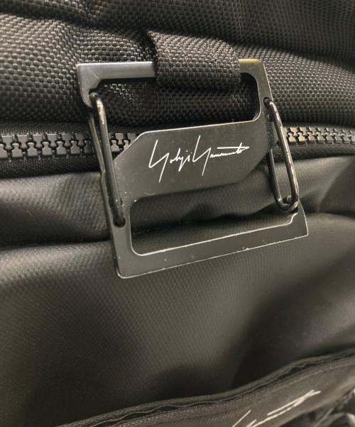 YOHJI YAMAMOTO（ヨウジヤマモト）YOHJI YAMAMOTO (ヨウジヤマモト) New Era (ニューエラ) RED LOGO BAGPACK/HZ-I58-661 ブラックの古着・服飾アイテム