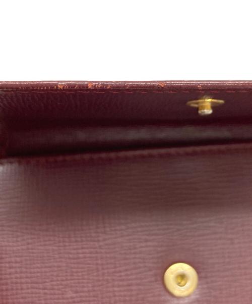 Cartier（カルティエ）Cartier (カルティエ) 3つ折り財布 ボルドーの古着・服飾アイテム