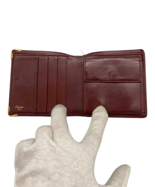 Cartier（カルティエ）Cartier (カルティエ) 2つ折りコンパクトウォレット レッドの古着・服飾アイテム