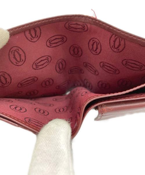 Cartier（カルティエ）Cartier (カルティエ) 2つ折りコンパクトウォレット レッドの古着・服飾アイテム