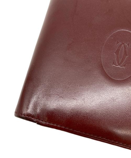 Cartier（カルティエ）Cartier (カルティエ) 2つ折りコンパクトウォレット レッドの古着・服飾アイテム