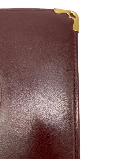 Cartier（カルティエ）Cartier (カルティエ) 2つ折りコンパクトウォレット レッドの古着・服飾アイテム