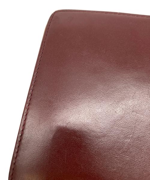 Cartier（カルティエ）Cartier (カルティエ) 2つ折りコンパクトウォレット レッドの古着・服飾アイテム