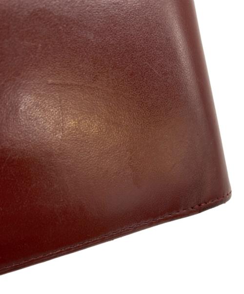 Cartier（カルティエ）Cartier (カルティエ) 2つ折りコンパクトウォレット レッドの古着・服飾アイテム