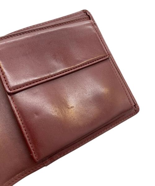Cartier（カルティエ）Cartier (カルティエ) 2つ折りコンパクトウォレット レッドの古着・服飾アイテム