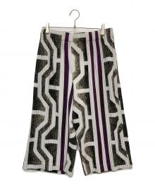 HOMME PLISSE ISSEY MIYAKE（オム プリッセ イッセイ ミヤケ）の古着「転写プリントクロップドプリーツパンツ」｜ホワイト