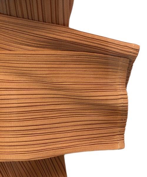 ISSEY MIYAKE（イッセイミヤケ）ISSEY MIYAKE (イッセイミヤケ) プリーツカーディガン オレンジ サイズ:Lの古着・服飾アイテム