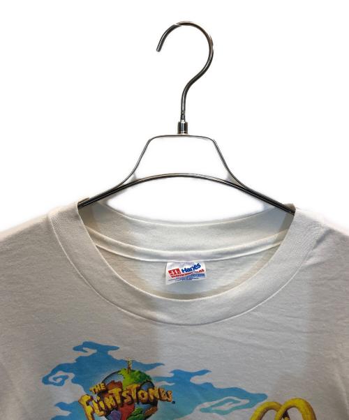 Hanes（ヘインズ）Hanes (ヘインズ) THE FLINTSTONES TEE ホワイト サイズ:X LARGEの古着・服飾アイテム