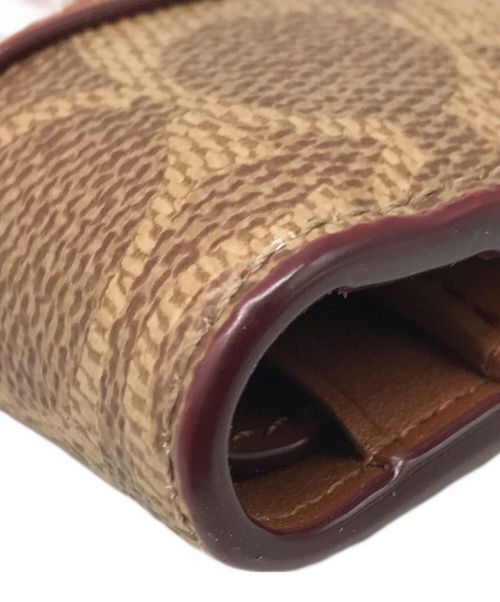 COACH（コーチ）COACH (コーチ) バイフォールド スナップ ウォレット ブラウンの古着・服飾アイテム