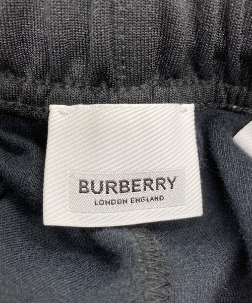 BURBERRY（バーバリー）BURBERRY (バーバリー) エンブロイダリーロゴサイドライントラックパンツ ブラック×ベージュ サイズ:XSの古着・服飾アイテム