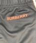 中古・古着 BURBERRY (バーバリー) エンブロイダリーロゴサイドライントラックパンツ ブラック×ベージュ サイズ:XS：13000円
