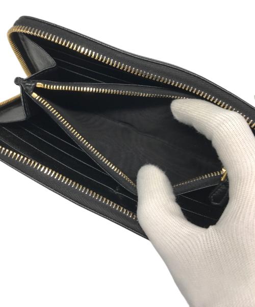 PRADA（プラダ）PRADA (プラダ) サフィアーノラウンドファスナーウォレット ブラックの古着・服飾アイテム