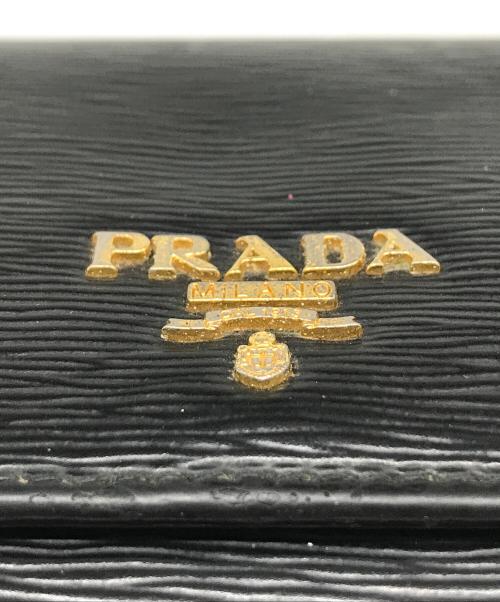 PRADA（プラダ）PRADA (プラダ) サフィアーノフラップロングウォレット ブラックの古着・服飾アイテム