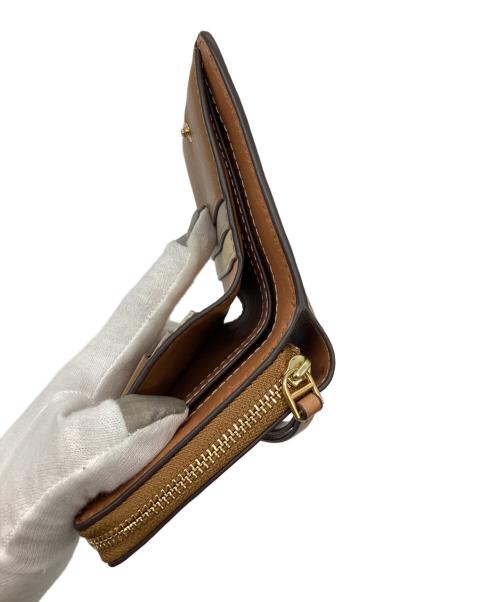 TORY BURCH（トリーバーチ）TORY BURCH (トリーバーチ) 2つ折り財布 ブラウンの古着・服飾アイテム
