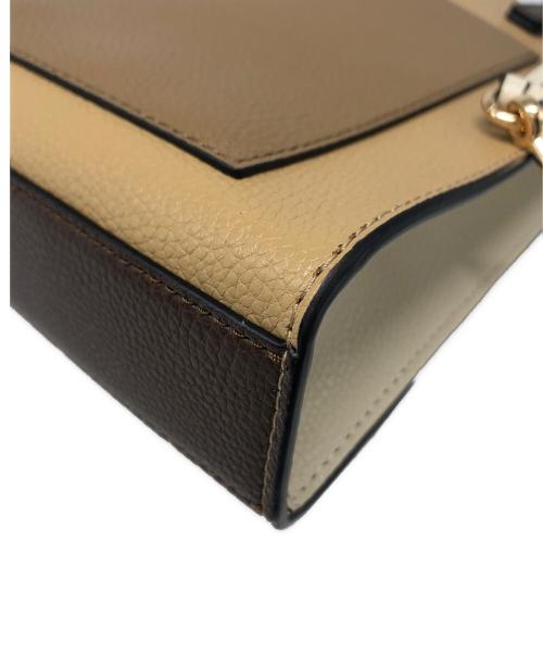MARC JACOBS（マークジェイコブズ）MARC JACOBS (マークジェイコブス) マイクログラインドレザー クロスボディバッグ ブラウン×ベージュの古着・服飾アイテム