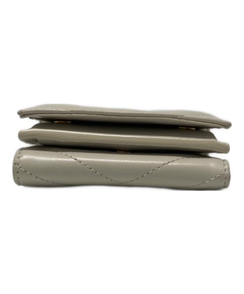 Saint Laurent Paris（サンローランパリ）Saint Laurent Paris (サンローランパリ) オリガミ タイニーコンパクトウォレット アイボリーの古着・服飾アイテム