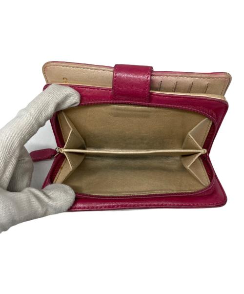 CHANEL（シャネル）CHANEL (シャネル) カメリア2つ折り財布 ピンクの古着・服飾アイテム