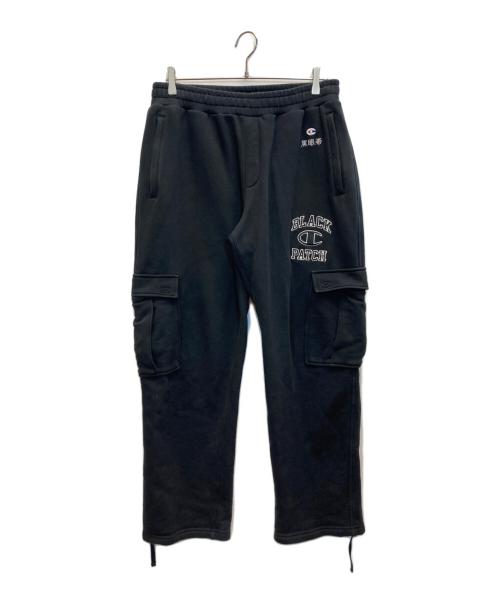 Champion（チャンピオン）Champion (チャンピオン) THE BLACK EYE PATCH (ブラックアイパッチ) 黒眼帯スウェットカーゴパンツ ブラック サイズ:Lの古着・服飾アイテム