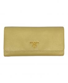 PRADA（プラダ）の古着「サフィアーノメタル 長財布」｜イエロー