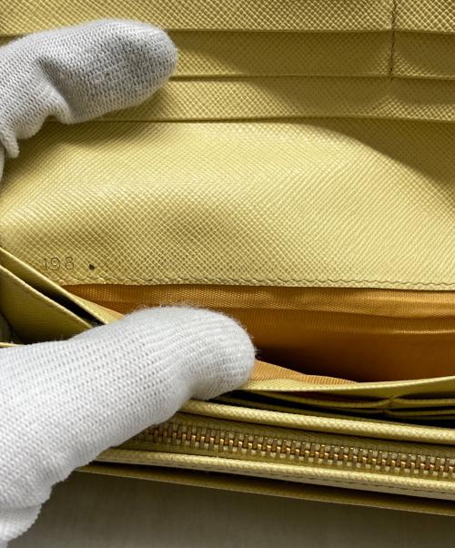 PRADA（プラダ）PRADA (プラダ) サフィアーノメタル 長財布 イエローの古着・服飾アイテム