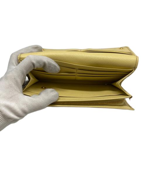 PRADA（プラダ）PRADA (プラダ) サフィアーノメタル 長財布 イエローの古着・服飾アイテム