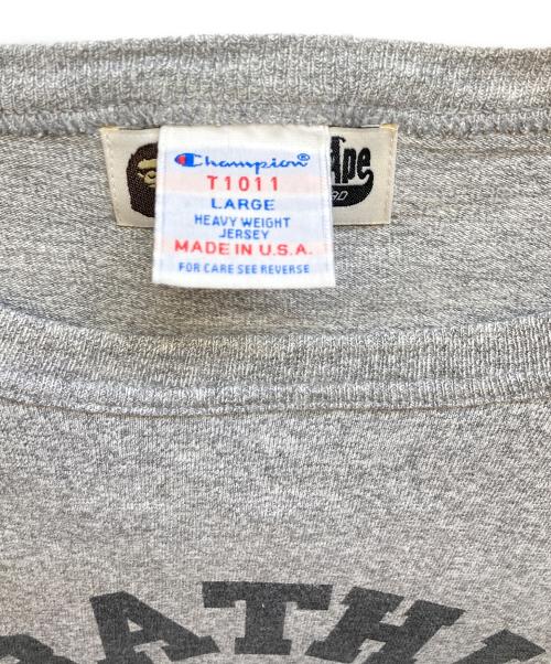 A BATHING APE（ア ベイシング エイプ）A BATHING APE (ア ベイシング エイプ) Champion (チャンピオン) T1011 ラグランスリーブカットソー グレー サイズ:LARGEの古着・服飾アイテム
