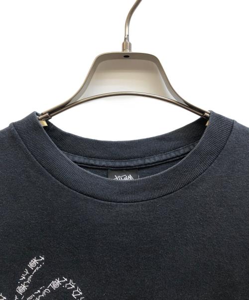 stussy（ステューシー）stussy (ステューシー) シャドーマンプリントTシャツ ブラック サイズ:Lの古着・服飾アイテム