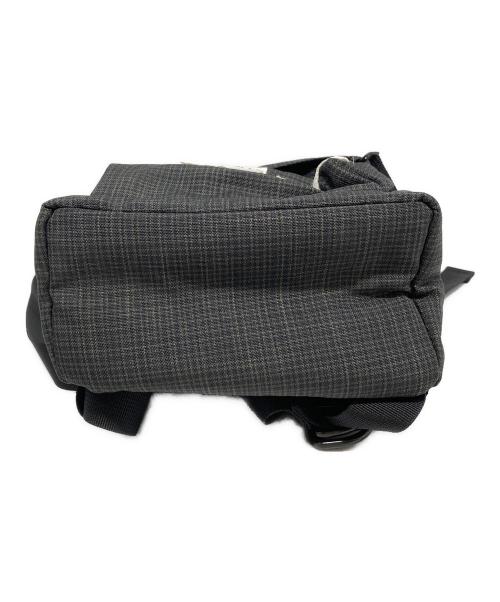 EASTPAK（イーストパック）EASTPAK (イーストパック) RAF SIMONS (ラフシモンズ) ミニバックパック ブラック 未使用品の古着・服飾アイテム