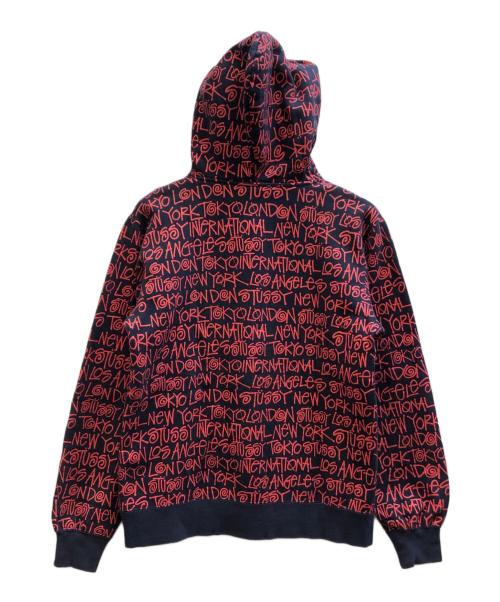 stussy（ステューシー）stussy (ステューシー) ワールドツアー総柄ロゴパーカー レッド×ネイビー サイズ:Ⅿの古着・服飾アイテム
