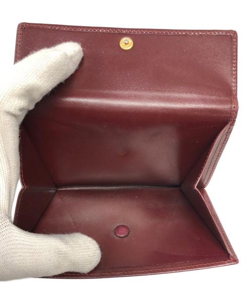 Cartier（カルティエ）Cartier (カルティエ) 3つ折り財布 レッドの古着・服飾アイテム