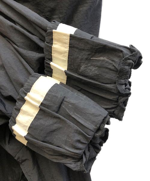 UMBRO（アンブロ）UMBRO (アンブロ) BELPER (ベルパー) M TO R (ムウトアール) ナイロントラックジャケット ブラック サイズ:Lの古着・服飾アイテム