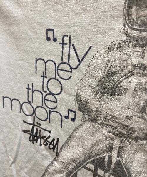 stussy（ステューシー）stussy (ステューシー) プリントTシャツ/Fly me to the moon ブルー サイズ:Mの古着・服飾アイテム