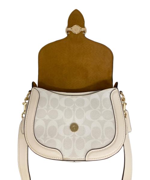 COACH（コーチ）COACH (コーチ) シグネチャーキャンバス ショルダーバッグ アイボリーの古着・服飾アイテム