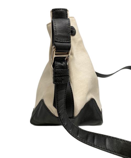 BALENCIAGA（バレンシアガ）BALENCIAGA (バレンシアガ) キャンバス巾着バッグ アイボリーの古着・服飾アイテム