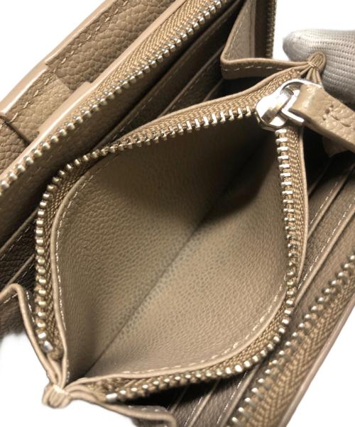 VASIC（ヴァジック）VASIC (ヴァジック) 2つ折り財布 ベージュの古着・服飾アイテム