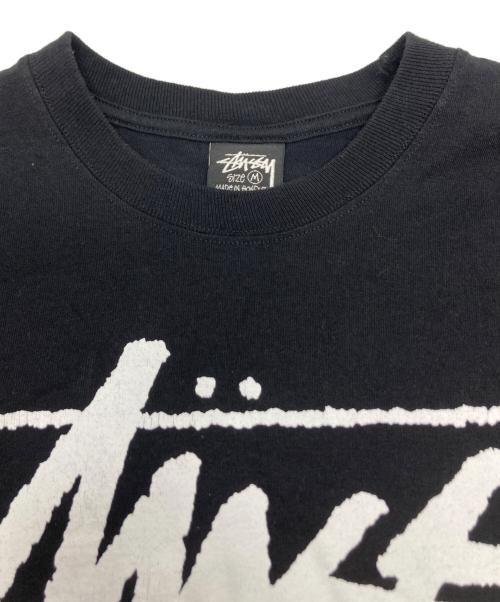 stussy（ステューシー）stussy (ステューシー) ワールドツアーTシャツ ブラック サイズ:Mの古着・服飾アイテム