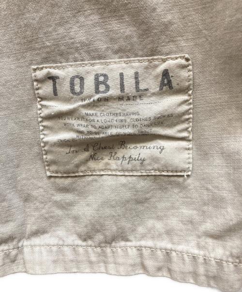 TOBILA（トビラ）TOBILA (トビラ) ムラ糸 ツイル 硫化染 ミリタリージャケット アイボリー サイズ:M 未使用品の古着・服飾アイテム