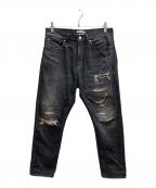 uniform experimentユニフォームエクスペリメント）の古着「DAMAGED DENIM TAPERED-FIT JEANS」｜グレー
