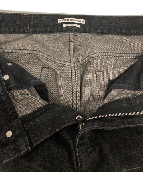 uniform experiment（ユニフォームエクスペリメント）uniform experiment (ユニフォームエクスペリメント) DAMAGED DENIM TAPERED-FIT JEANS グレー サイズ:1の古着・服飾アイテム