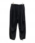 COMOLIコモリ）の古着「コットンジャージニータックパンツ」｜ブラック