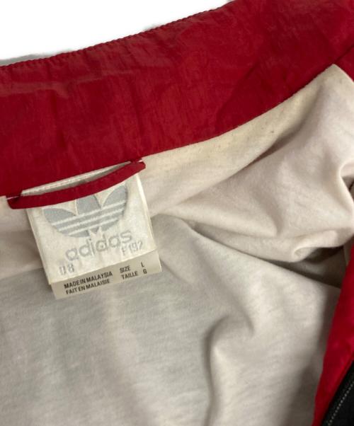 adidas（アディダス）adidas (アディダス) ナイロンジャケット ブラック×レッド サイズ:Lの古着・服飾アイテム