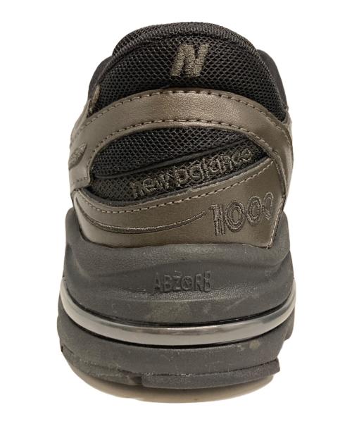 NEW BALANCE（ニューバランス）NEW BALANCE (ニューバランス) UNITED ARROWS (ユナイテッドアローズ) M1000UA カーキ×ブラック サイズ:US9.5の古着・服飾アイテム