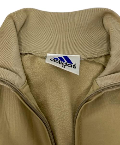 adidas（アディダス）adidas (アディダス) トラックジャケット ベージュ サイズ:Mの古着・服飾アイテム