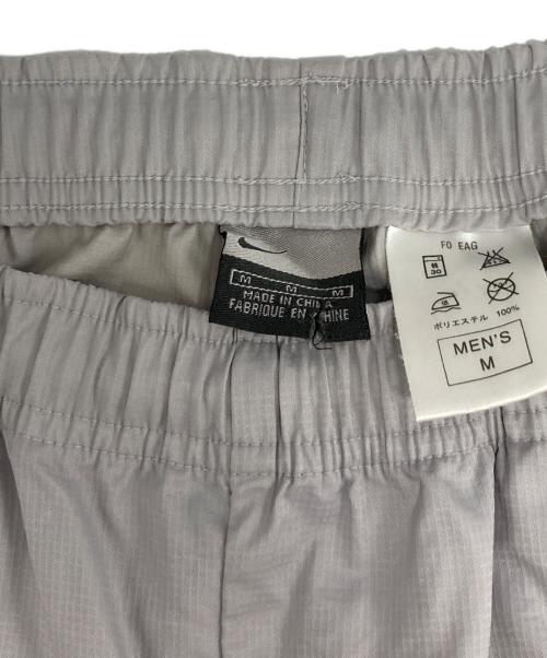 NIKE（ナイキ）NIKE (ナイキ) ナイロンパンツ グレー サイズ:Mの古着・服飾アイテム