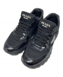 PRADA（プラダ）の古着「PRAX 01 Re-Nylon xブラッシュドレザー スニーカー」｜ブラック