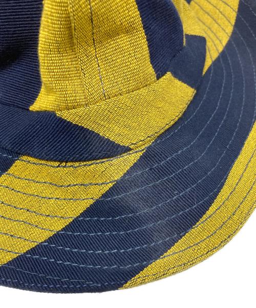 BODE（ボーディ）BODE (ボーディ) ストライプバケットハット イエロー×ネイビーの古着・服飾アイテム